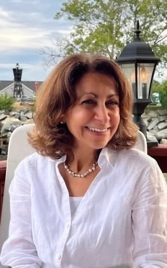 Karen Shehade smiling on the Rockland waterfront